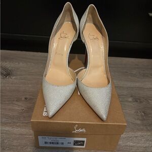 Christian Louboutin Silver Glitter Pointed Toe Pumps with Signature Red Sole